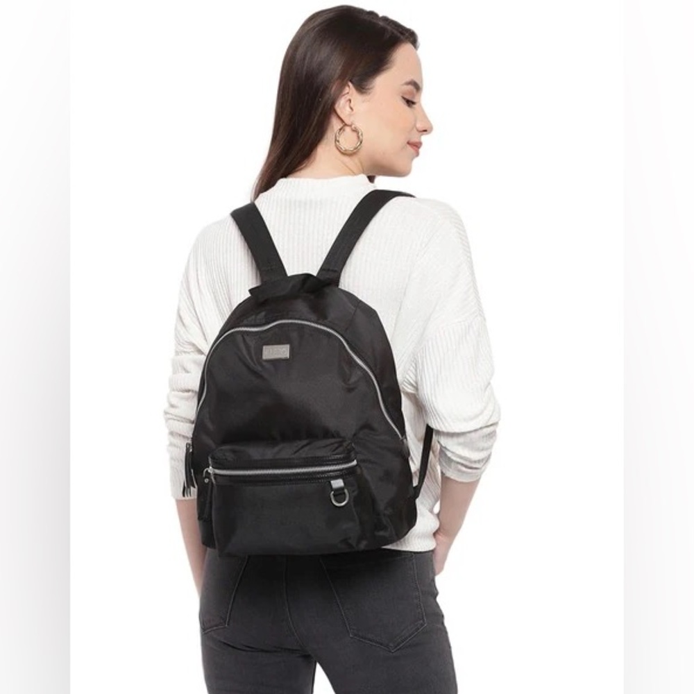 NWOT Roots Chelsea Back Pack black zippered pockets and adjustable strap